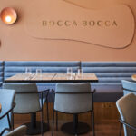 Shelly Iceblast leather banquette under the Bocca Bocca sign 