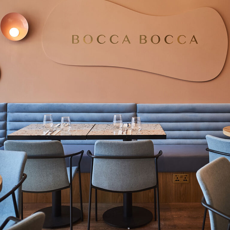 Shelly Iceblast leather banquette under the Bocca Bocca sign 