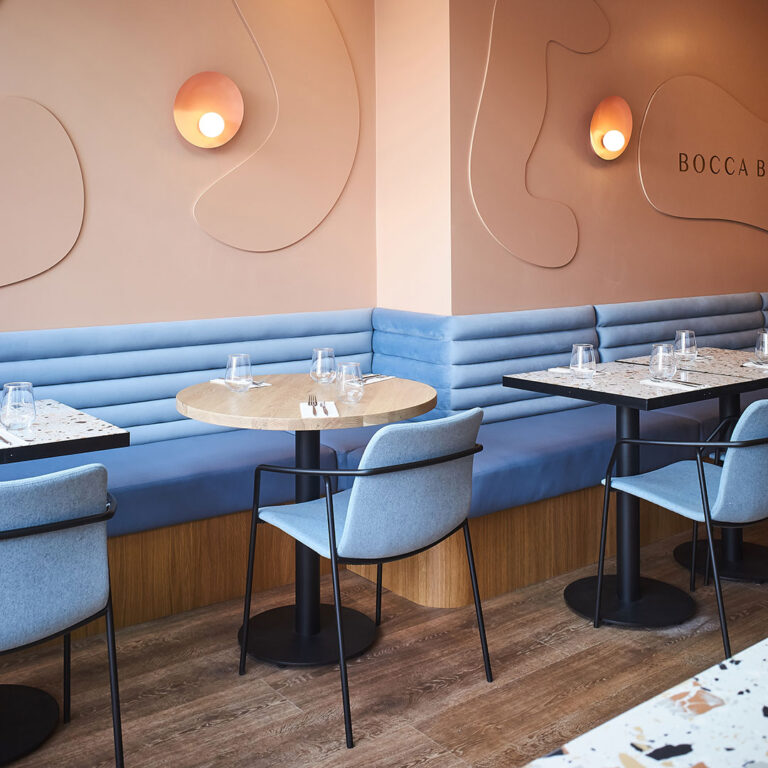 Shelly Iceblast leather banquette and round tables at Bocca Bocca 