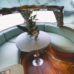 Vele Jade Green leather banquette seating in an Airstream caravan