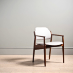 Restored Arne Vodder Model 62A armchair in white leather, three-quarter view