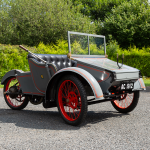 Restored 1903 AC Sociable tricycle car with black buttoned leather seats
