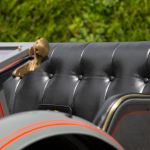 Close-up of the black buttoned leather seat back on a 1903 AC Sociable