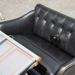 Black buttoned leather bench seat on a 1903 AC Sociable