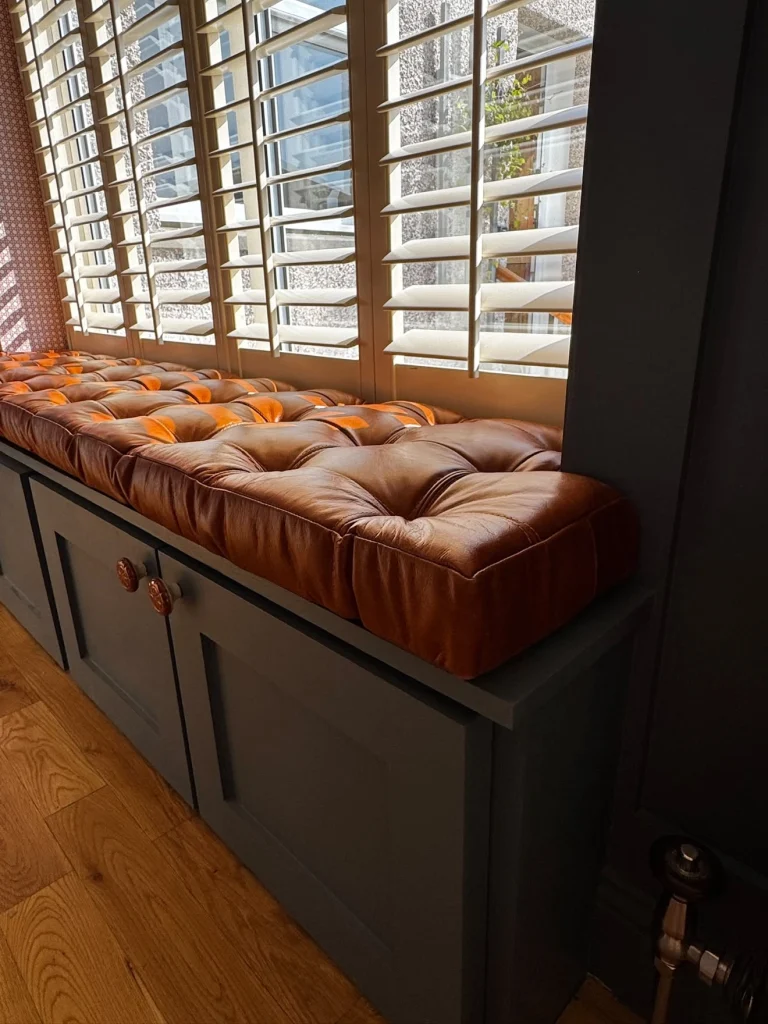 Buttoned Old English Malt leather window seat cushion