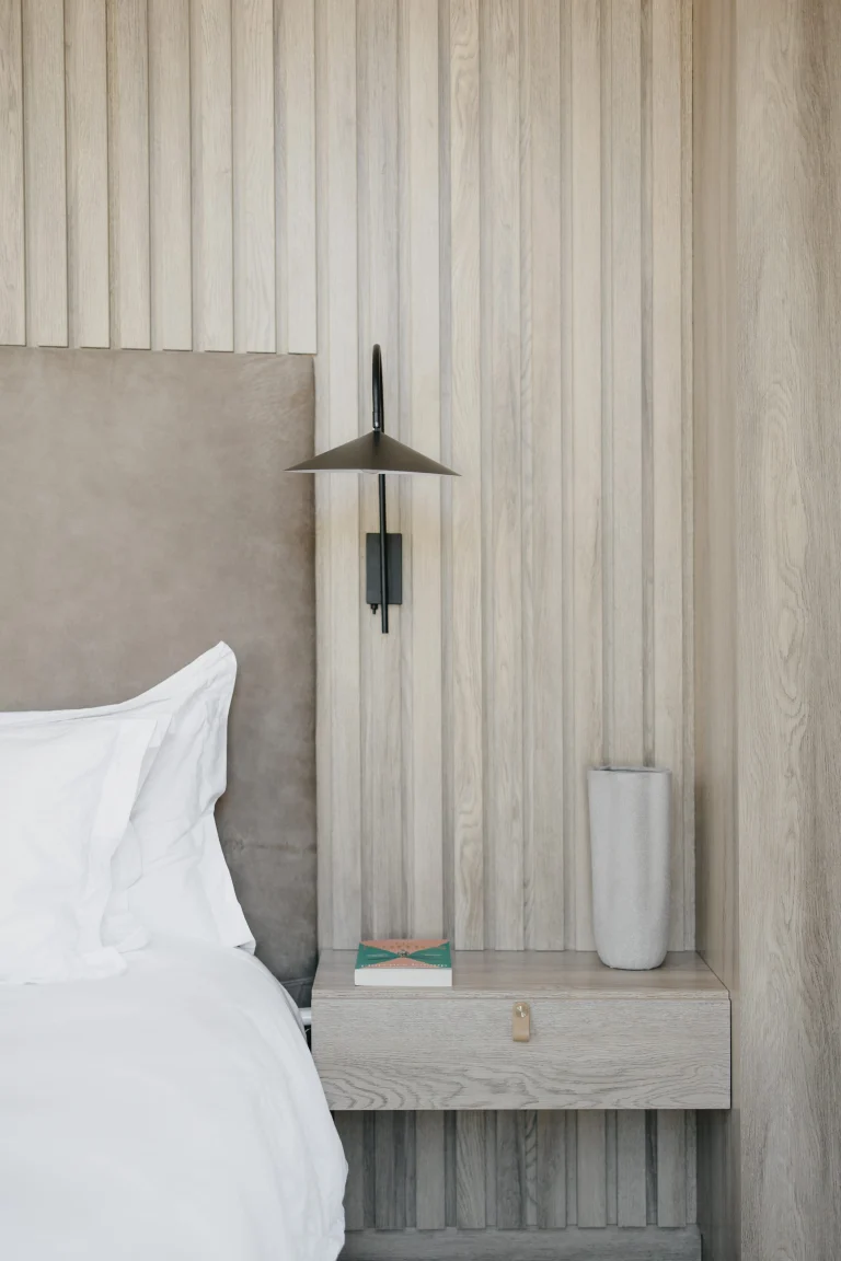 Taupe leather headboard and bedside table, Project Haasbroek