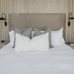 Bedroom with a taupe leather headboard, Project Haasbroek