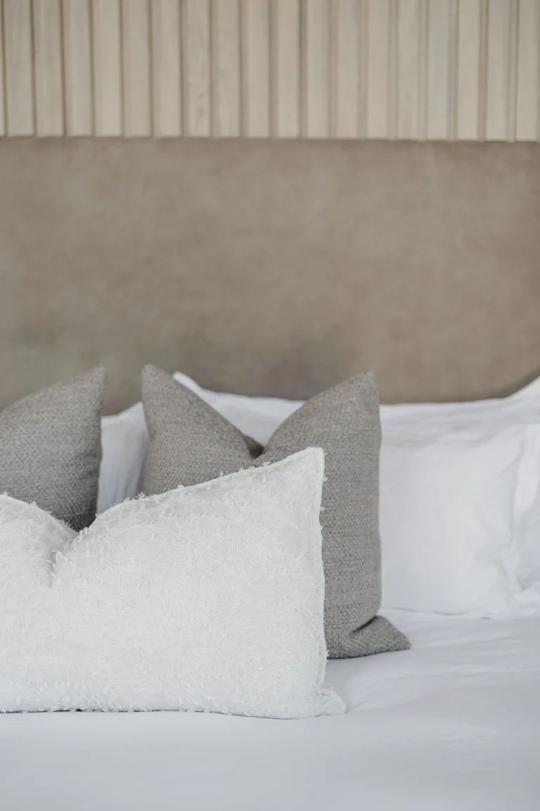 Close-up of a taupe leather headboard, Project Haasbroek