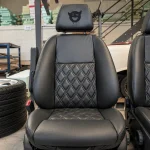 Diamond-quilted black leather front seat by Trimatt Ltd.