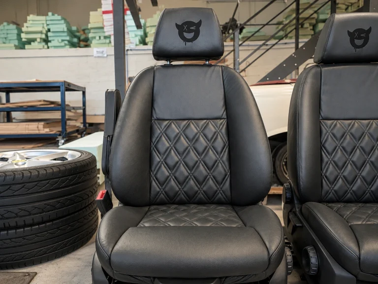 Diamond-quilted black leather front seat by Trimatt Ltd.
