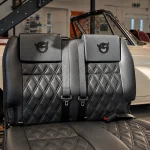 Black leather bench seat with diamond quilting by Trimatt Ltd.